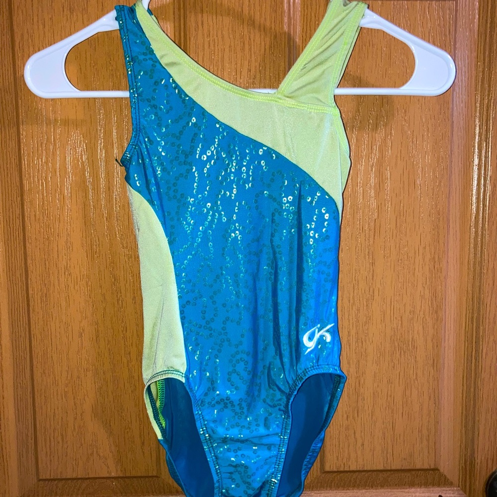 Gymnastics/swimsuit blue/yellow color. Sized small in kids.